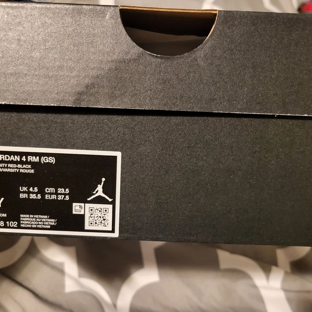 Jordan White and Red Sneakers Retro-Inspired Design - Picture 2 of 8